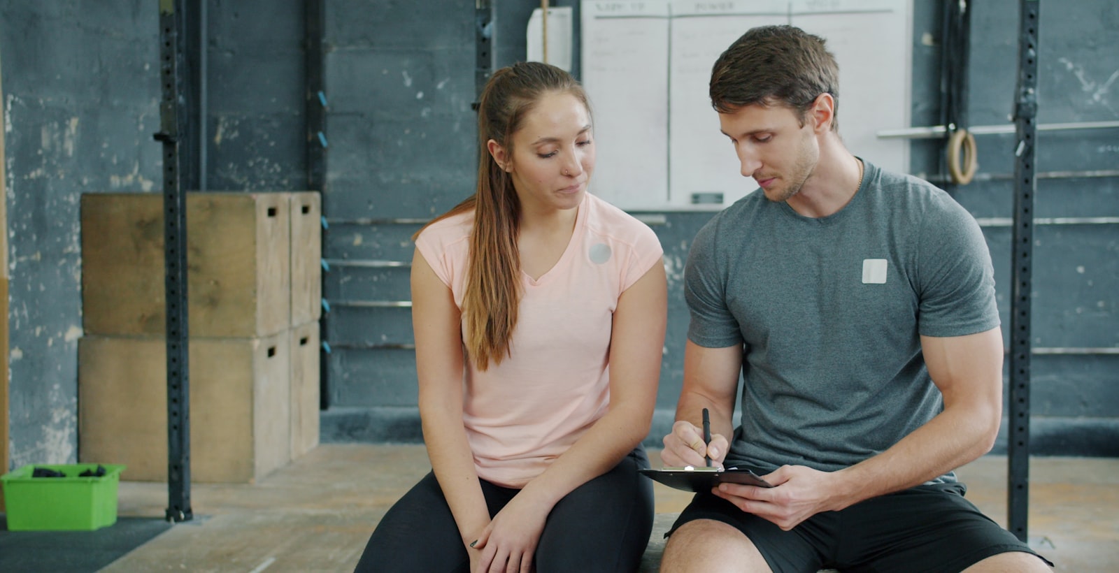 A coach reviewing a plan with a client